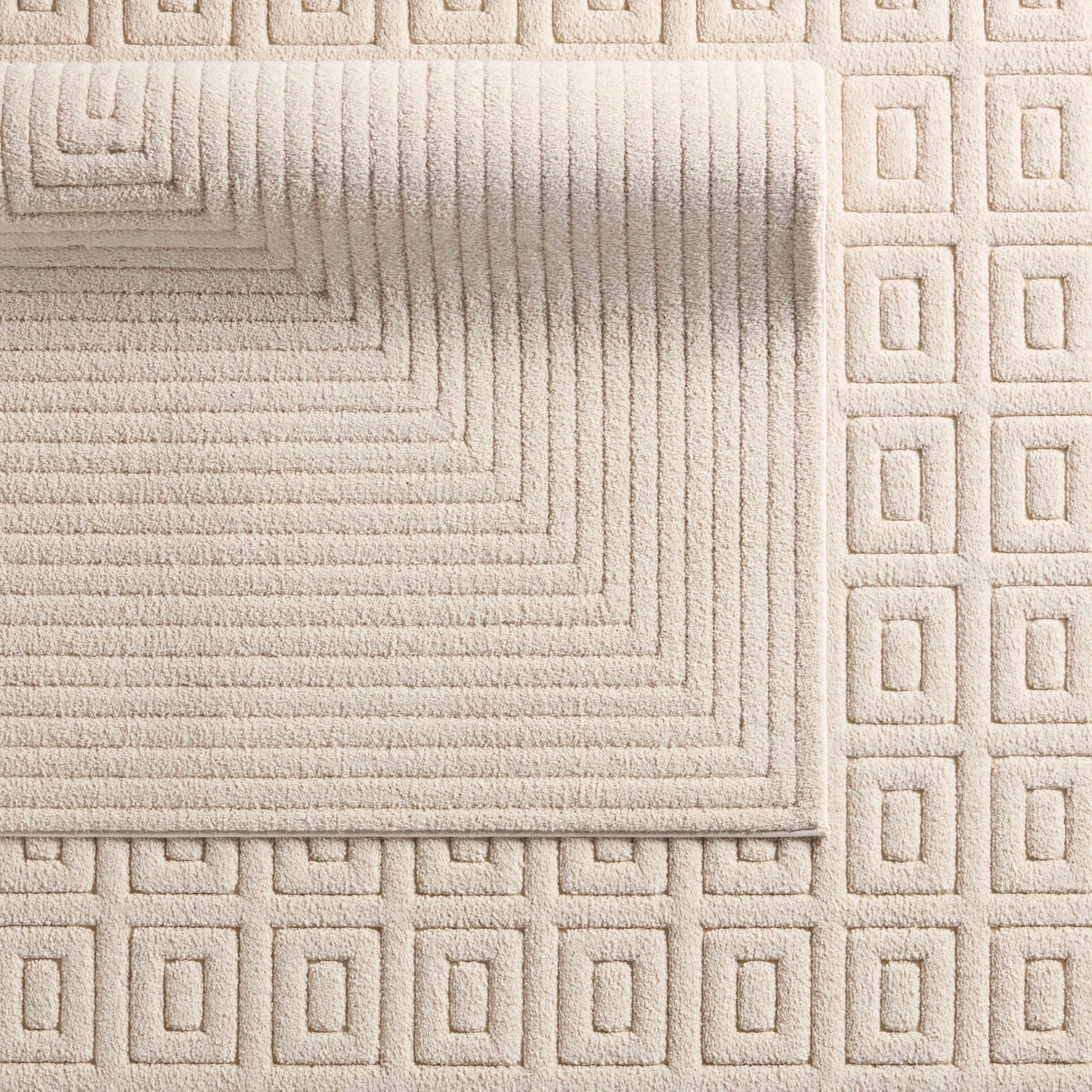 006 SI-2077654,SI-2077655,SI-2077656,SI-2077657,SI-2077658 | Closeup | Petros PTR06 Rug by Jaipur Living in cream. Made from 100% polyester in a unique style.