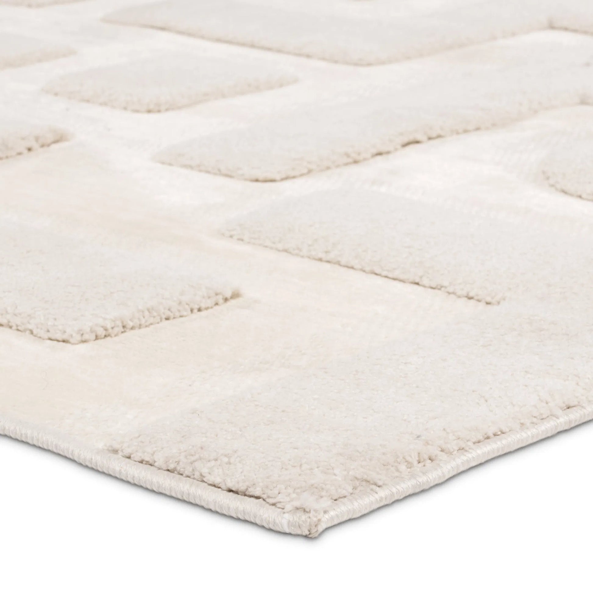 Petros PTR08 Rug by Jaipur Living in ivory. Made from 80% polyester, 20% chenille in a unique style.