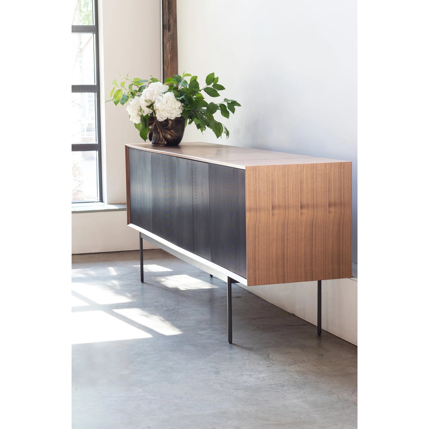 007 SI-2121845 | Lifestyle | Araya Sideboard by Moe's Home Collection in walnut, black. Made from walnut veneer, metal base, mdf in a modern style.