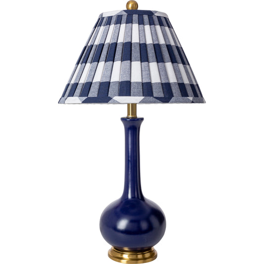 Paityn Table Lamp by Livabliss in body: navy, base: gold, shade (outside): blue, shade (inside): white, finial: metallic - nickel, harp: metallic - nickel, cord: translucent and glazed, plated. Made from body: ceramic, ba