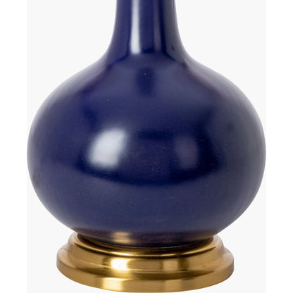 Paityn Table Lamp by Livabliss in body: navy, base: gold, shade (outside): blue, shade (inside): white, finial: metallic - nickel, harp: metallic - nickel, cord: translucent and glazed, plated. Made from body: ceramic, base: meta