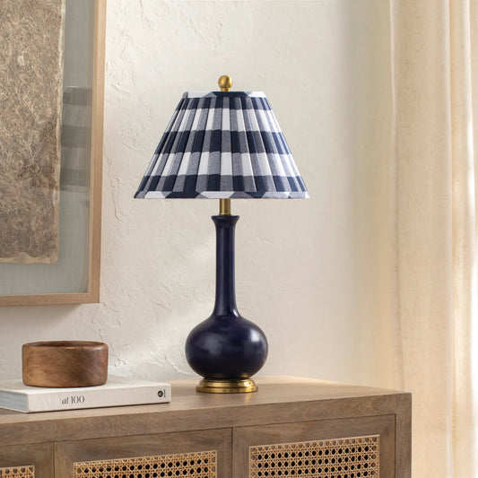 Paityn Table Lamp by Livabliss in body: navy, base: gold, shade (outside): blue, shade (inside): white, finial: metallic - nickel, harp: metallic - nickel, cord: translucent and glazed, plated. Made from body: ceramic, base: me