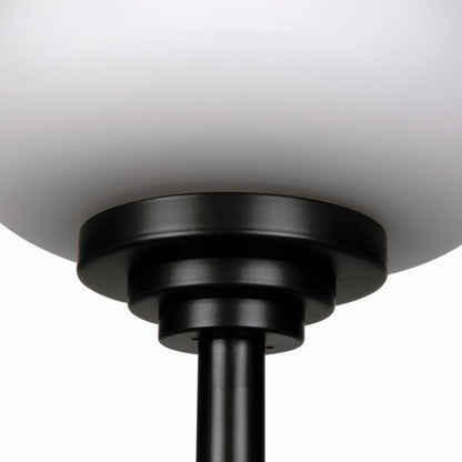 Charlotte Lamp by Noir in matte black. Made from industrial steel and frosted glass in a modern style.