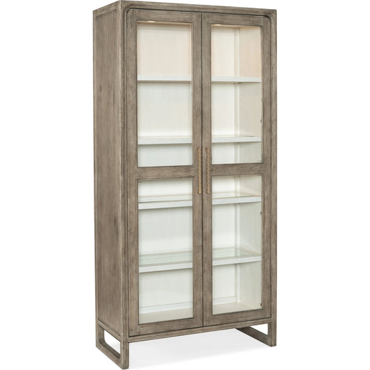 Serenity Sanderling Display Cabinet by Hooker Furniture in malibu, champagne. Made from oak veneers, tempered glass in a modern style.