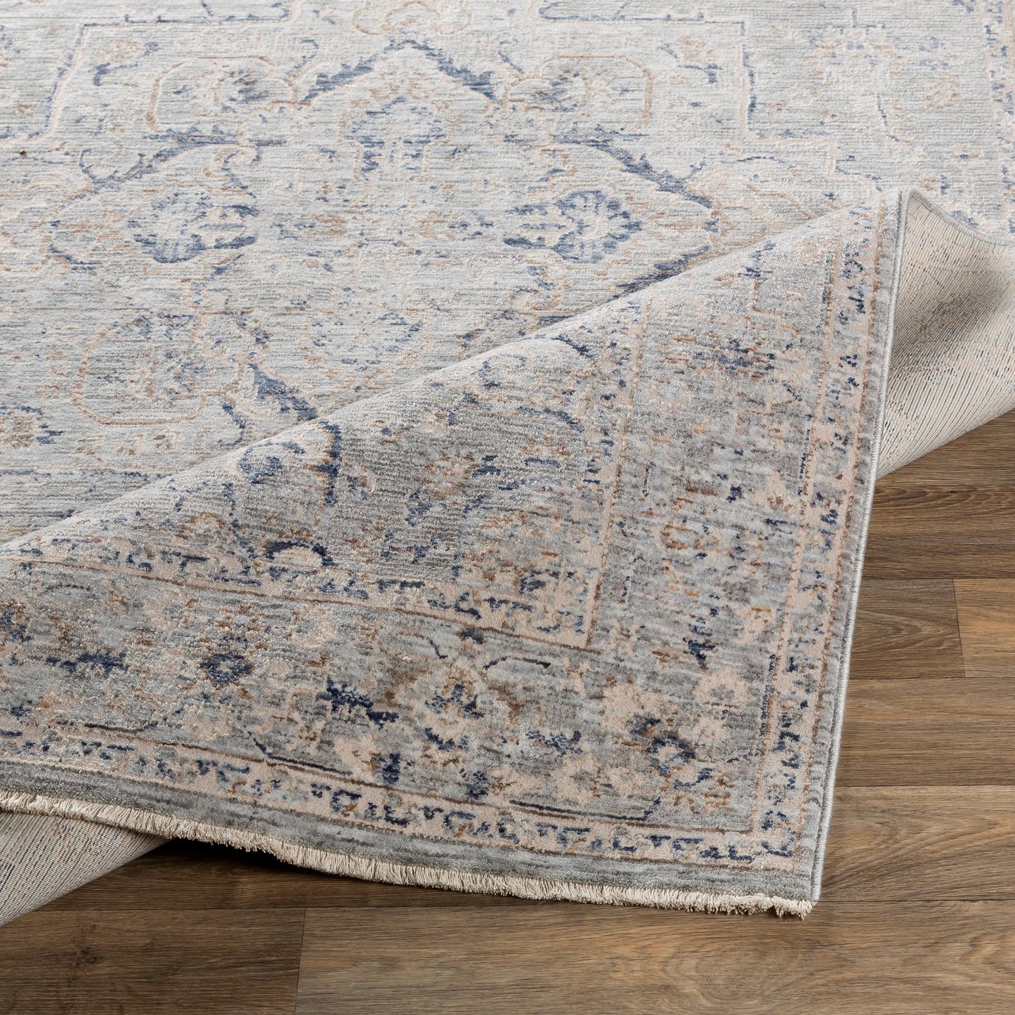 006 SI-1888047,SI-1888048,SI-1888049,SI-1888051 | Closeup | Palazzo Rug - 23912 by Livabliss in taupe, rose, pale blue, denim, navy, brown. Made from 70% polyester, 30% viscose in a unique style.