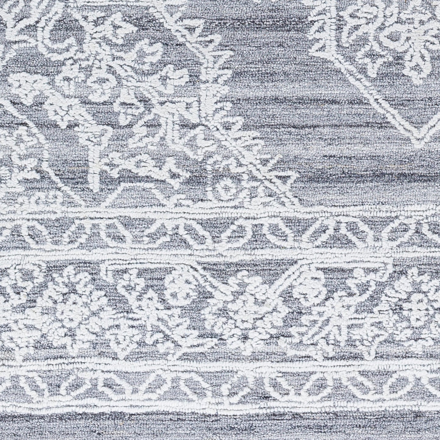011 SI-1920438 | Closeup | Piazza Rug by Livabliss. Made from 100% recycled pet yarn in a modern style.