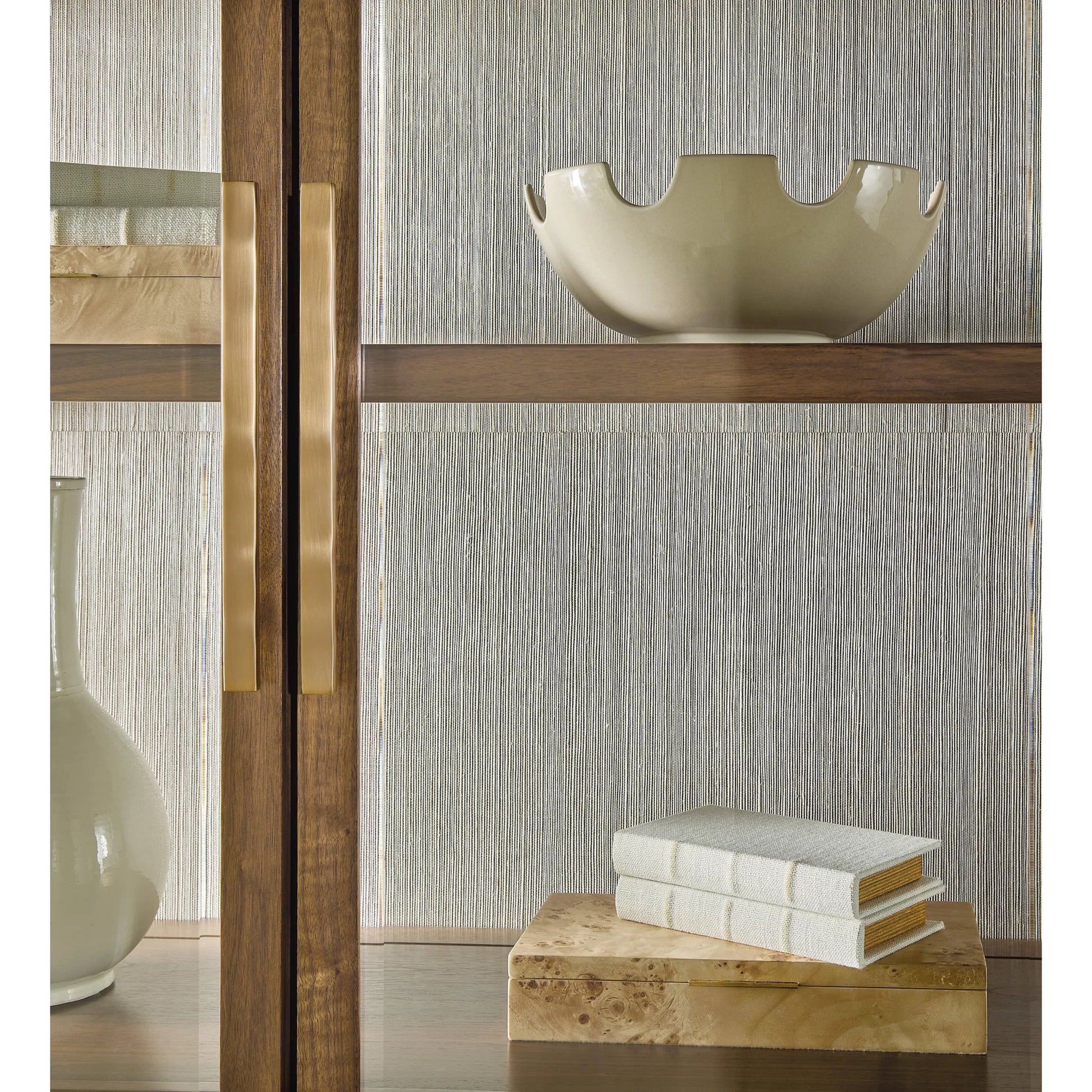 Eleana Display Cabinet by Hooker Furniture in light caramel, quartered walnut veneers. Made from walnut veneers, glass, wall cover in a traditional style.