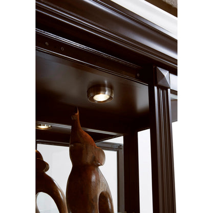 Two Way Sliding Door Curio Cabinet in Cherry Brown by Pulaski Furniture in dark cherry brown. Made from select hardwoods, primavera veneers, manufactured wood, fabric in a traditional style.