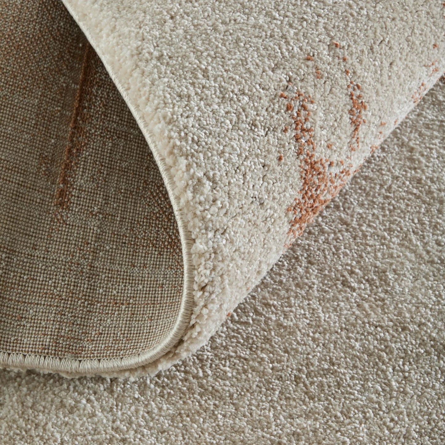 005 SI-2635522,SI-2635523,SI-2635524,SI-2635525,SI-2635526 | Closeup | Gilmore GIL39UOF Rug by Feizy in ivory, orange, gray. Made from polypropylene in a unique style.