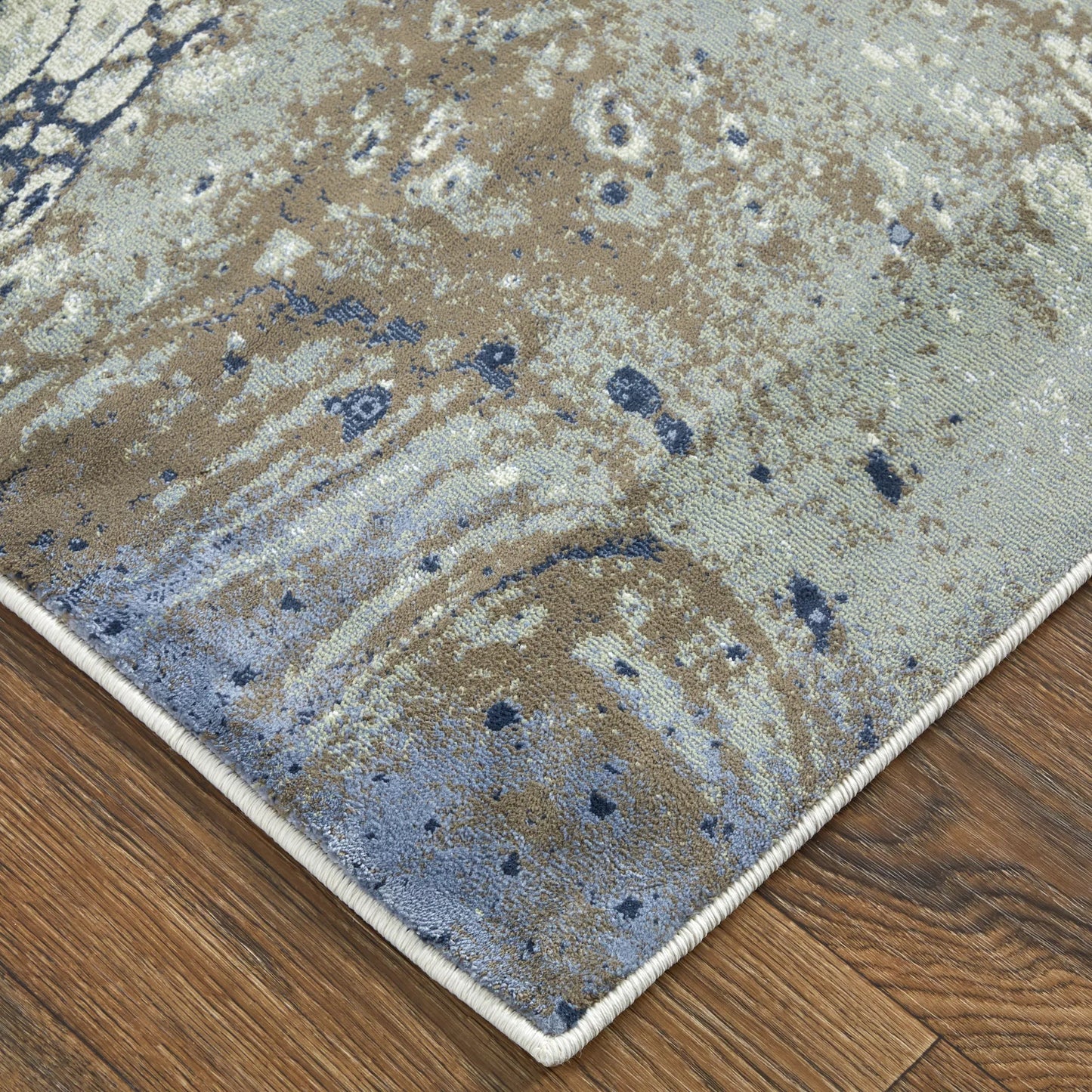 002 SI-2518387,SI-2518388 | Closeup | Mandana CME39M1F Rug by Feizy in ivory, taupe, blue. Made from polyester, polypropylene in a unique style.