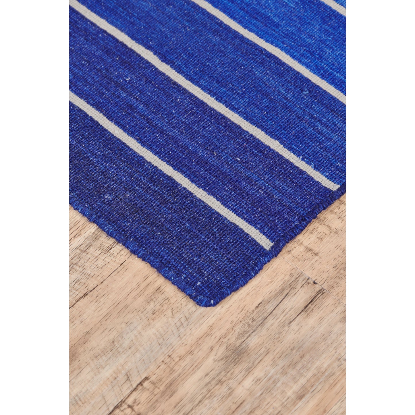006 SI-1869486,SI-1869487 | Closeup | Santino Transitional Stripes Rug - 0562F by Feizy in blue. Made from wool in a unique style.