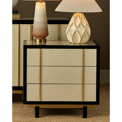 Deanna Raffia Nightstand by Currey and Company in ivory, black, brushed brass, natural, dusty blue, clear. Made from raffia, okume veneer, stainless steel, sycamore veneer, tempered glass in a modern style.