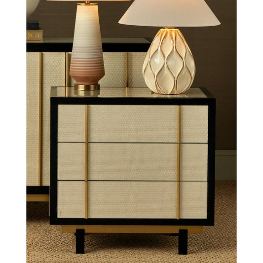Deanna Raffia Nightstand by Currey and Company in ivory, black, brushed brass, natural, dusty blue, clear. Made from raffia, okume veneer, stainless steel, sycamore veneer, tempered glass in a modern style.