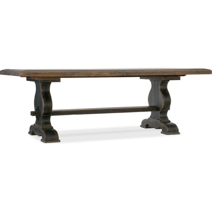 Bandera Dining Table by Hooker Furniture in saddle brown, anthracite black. Made from white oak, walnut veneers with resin in a traditional style.