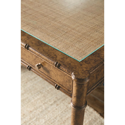 Archives Writing Desk by Hooker Furniture in medium wood and mottled amber. Made from birch veneers, oak veneers, cane, ultra-white tempered glass in a traditional style.