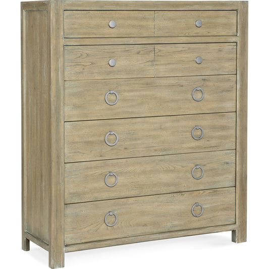 Surfrider Six Drawer Chest by Hooker Furniture in driftwood. Made from pecan veneers, cedar, felt panel, self-closing undermount drawer guides, solid-wood edge top in a modern style.