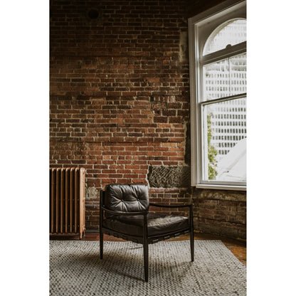 Turner Chair by Moe's Home Collection in black. Made from ash wood frame, top-grain buffalo leather, foam cushion with a feather wrap in a modern style.