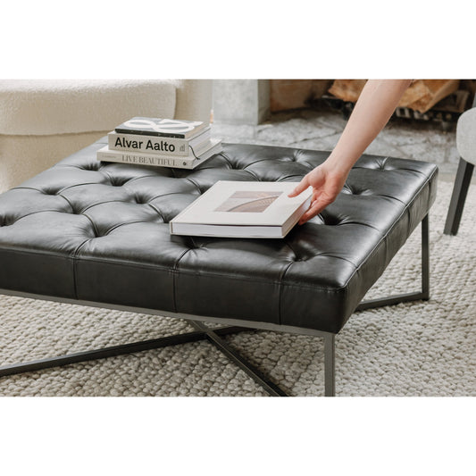Emanuel Coffee Table by Moe's Home Collection in black. Made from top-grain buffalo leather, iron legs, pine wood seat frame, foam in a transitional style.