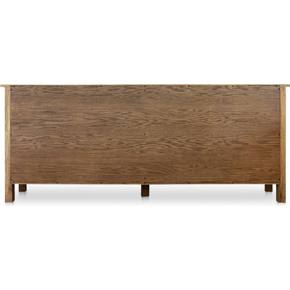 Caroline Sideboard by Moe's Home Collection in warm brown. Made from solid oak frame, oak veneer over mdf side panel, drawer in a transitional style.