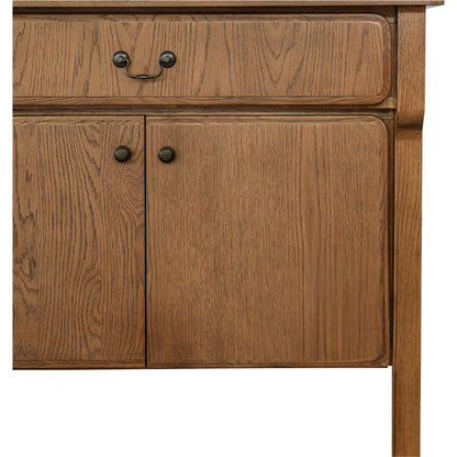Caroline Sideboard by Moe's Home Collection in warm brown. Made from solid oak frame, oak veneer over mdf side panel, drawer in a transitional style.