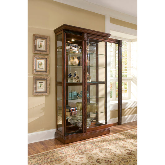 43'' Wide Medallion Cherry Curio Display Cabinet by Pulaski Furniture in rich cherry. Made from hardwood solids in a traditional style.
