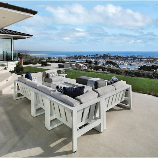 Newport Outdoor Sectional by Sunset West in frost. Made from aluminum in a modern style.