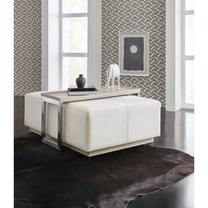 Melange Bridged Cocktail Table by Hooker Furniture in light wood. Made from hair on hide leather with metal, veneer in a modern style.