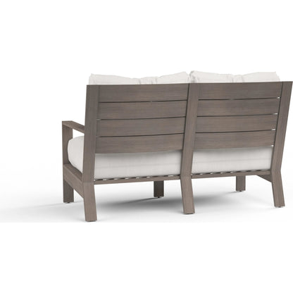 Laguna Outdoor Loveseat by Sunset West in browns. Made from aluminum in a modern style.