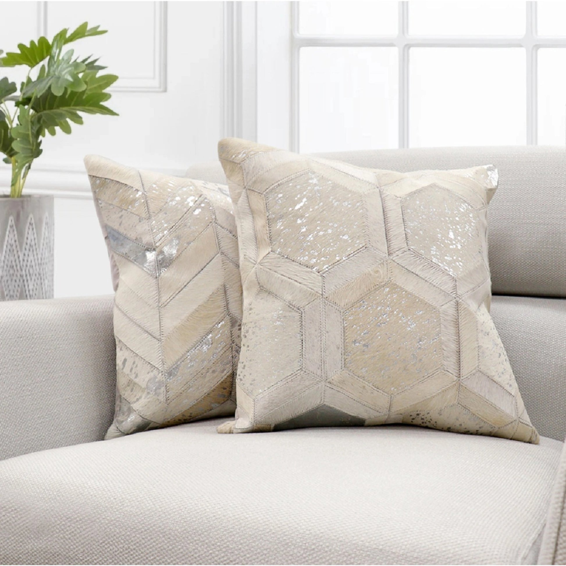 Safari Geometric Cowhide 17" Decorative Throw Pillow by Pasargad Home in silver. Made from cowhide in a modern style.