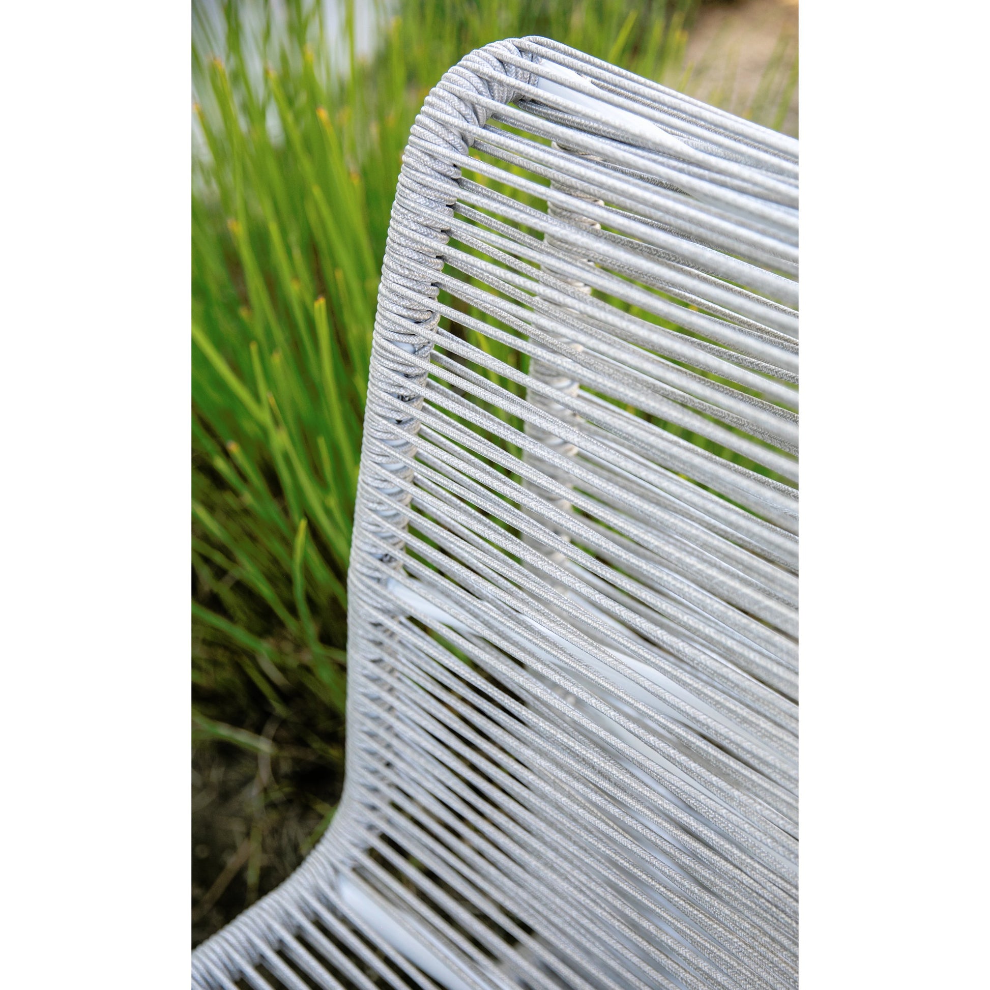 Milano Outdoor Armless Club Chair by Sunset West. Made from olefin rope in a coastal style.