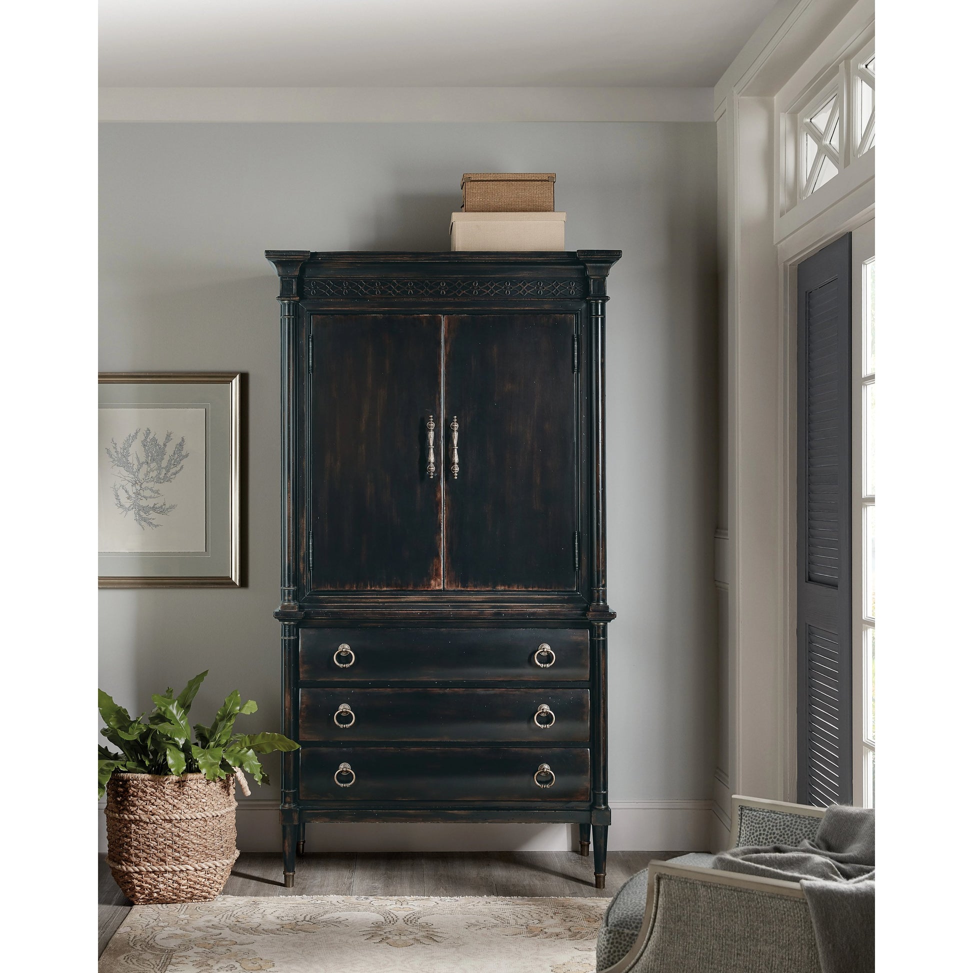 Charleston Jewelry Armoire by Hooker Furniture in black cherry. Made from cherry veneers, cedar, metal in a traditional style.