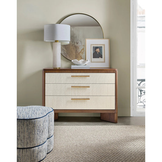Eleana Three Drawer Chest by Hooker Furniture in light caramel, quartered walnut veneers. Made from walnut veneers, wall covering in a modern style.