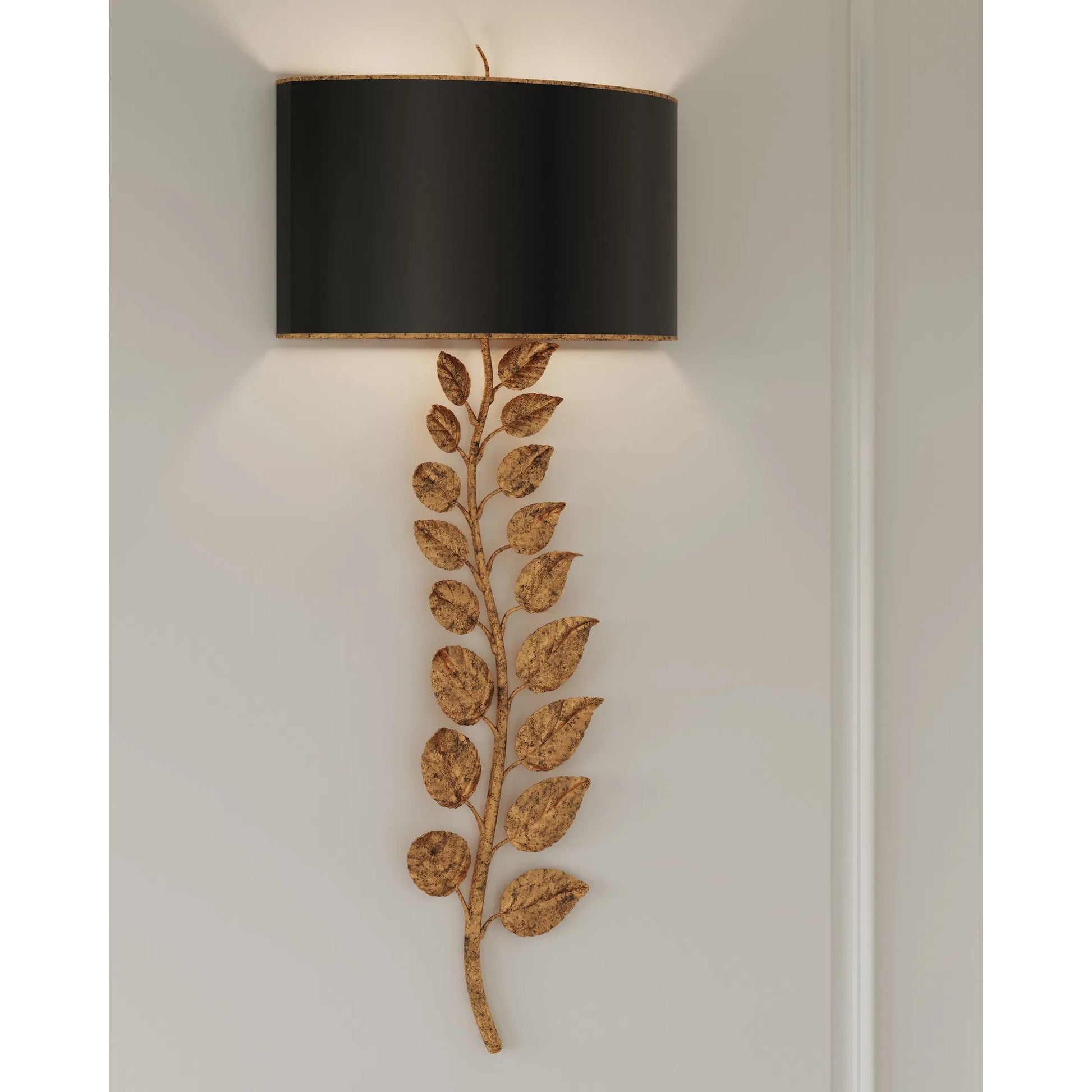 Birdwood Wall Sconce by Currey and Company in textured gold leaf, satin black. Made from satin black, gesso in a transitional style.
