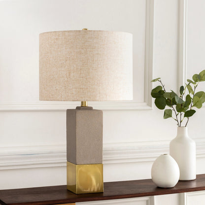Rodez - 32426 by Surya in gray, black, white, metallic brass and polishednaturalpolished. Made from shade (outside): linen, shade (inside): polyester, body: concrete, base: metal, finial: iron, harp: iron in a modern style.
