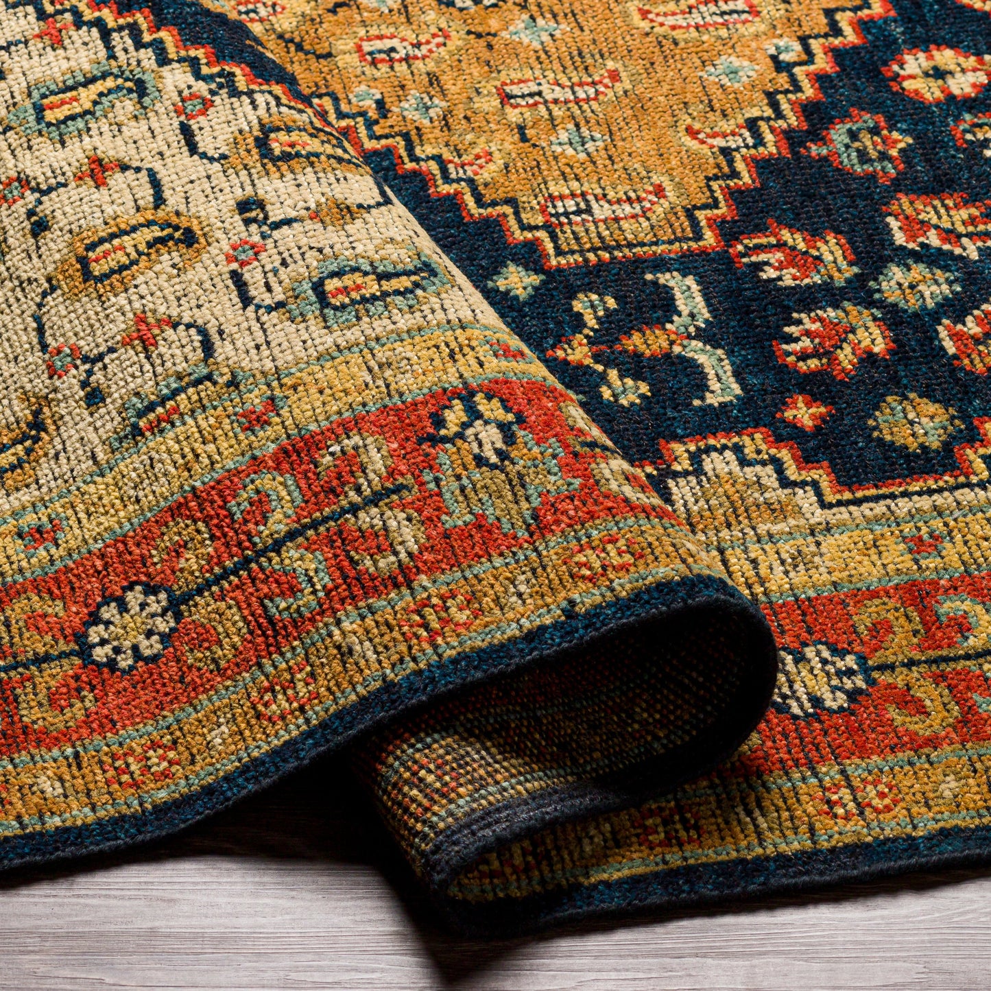 006 SI-1889378,SI-1889379,SI-1889381 | Closeup | Reign REG-2300 Rug by Surya in navy, tan, beige, rust, mustard, blue. Made from 100% new zealand wool in a unique style.