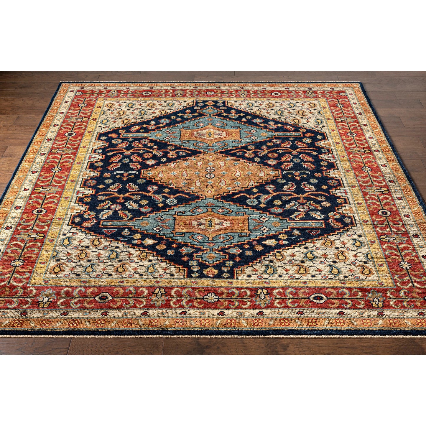 002 SI-1889378,SI-1889379,SI-1889381 | Closeup | Reign REG-2300 Rug by Surya in navy, tan, beige, rust, mustard, blue. Made from 100% new zealand wool in a unique style.