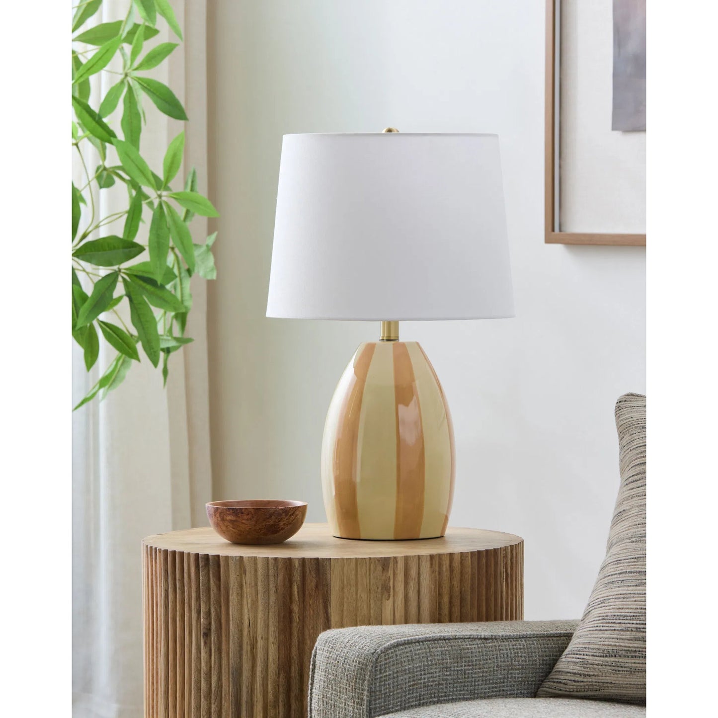002 SI-2258875 | Lifestyle | Rethel Accent Table Lamp by Livabliss in yellow and glazed, plated. Made from ceramic, linen, polyester, iron in a eclectic & global style.