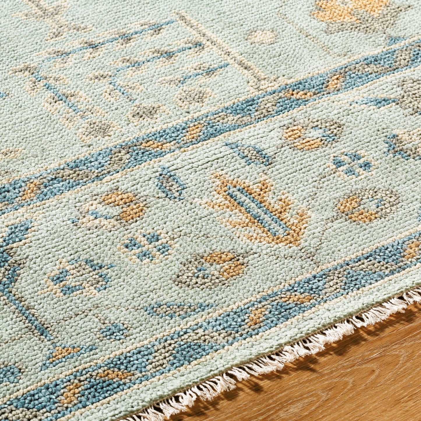 004 SI-2165432,SI-2165433,SI-2165434,SI-2165435,SI-2165436,SI-2165437 | Closeup | Riviera RIV-2304 Rug by Surya in sky blue, goldenrod, slate gray, ivory, cornflower blue. Made from new zealand wool, cotton in a unique style.