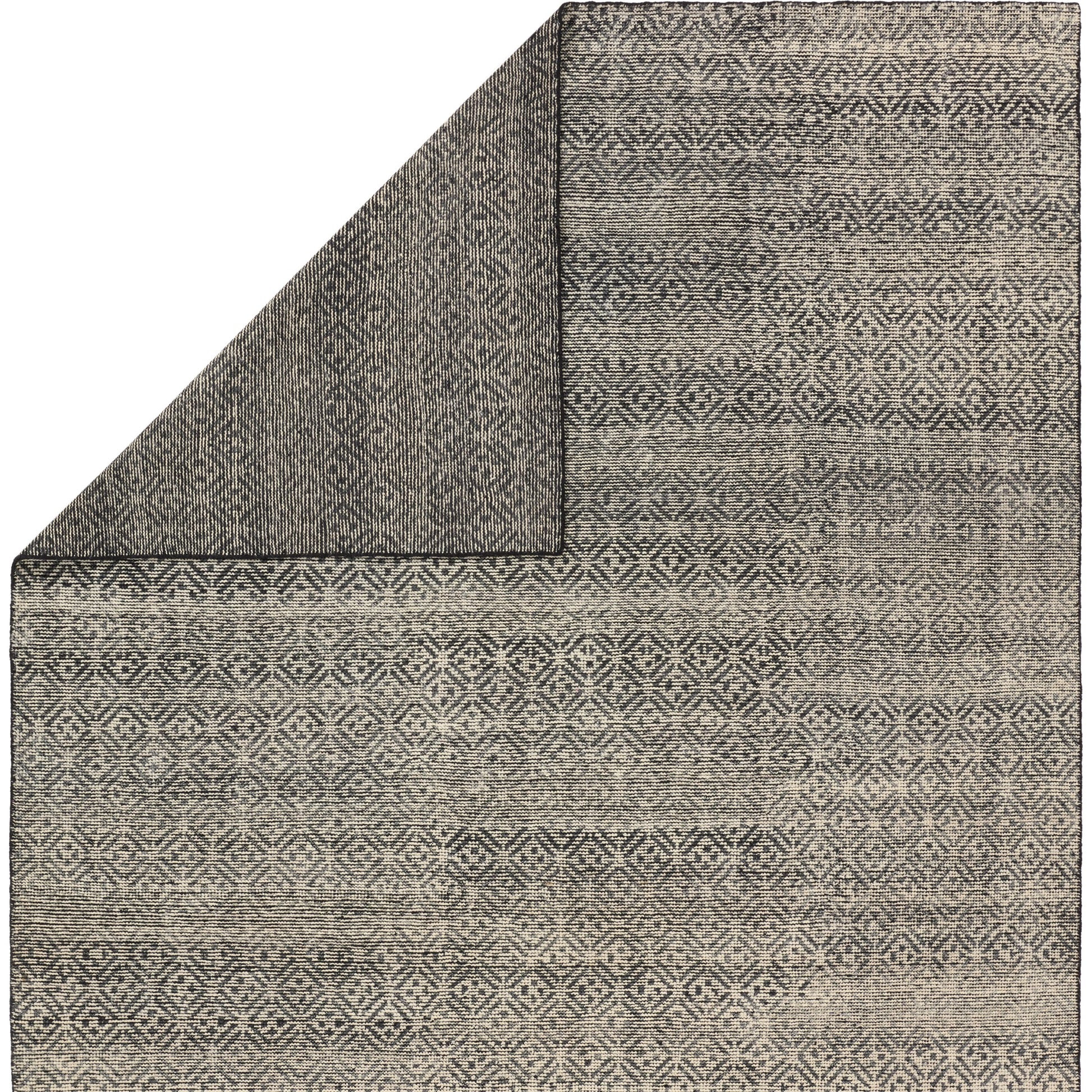 Rize Akello Rug by Jaipur Living in black, cream. Made from 100% wool in a unique style.