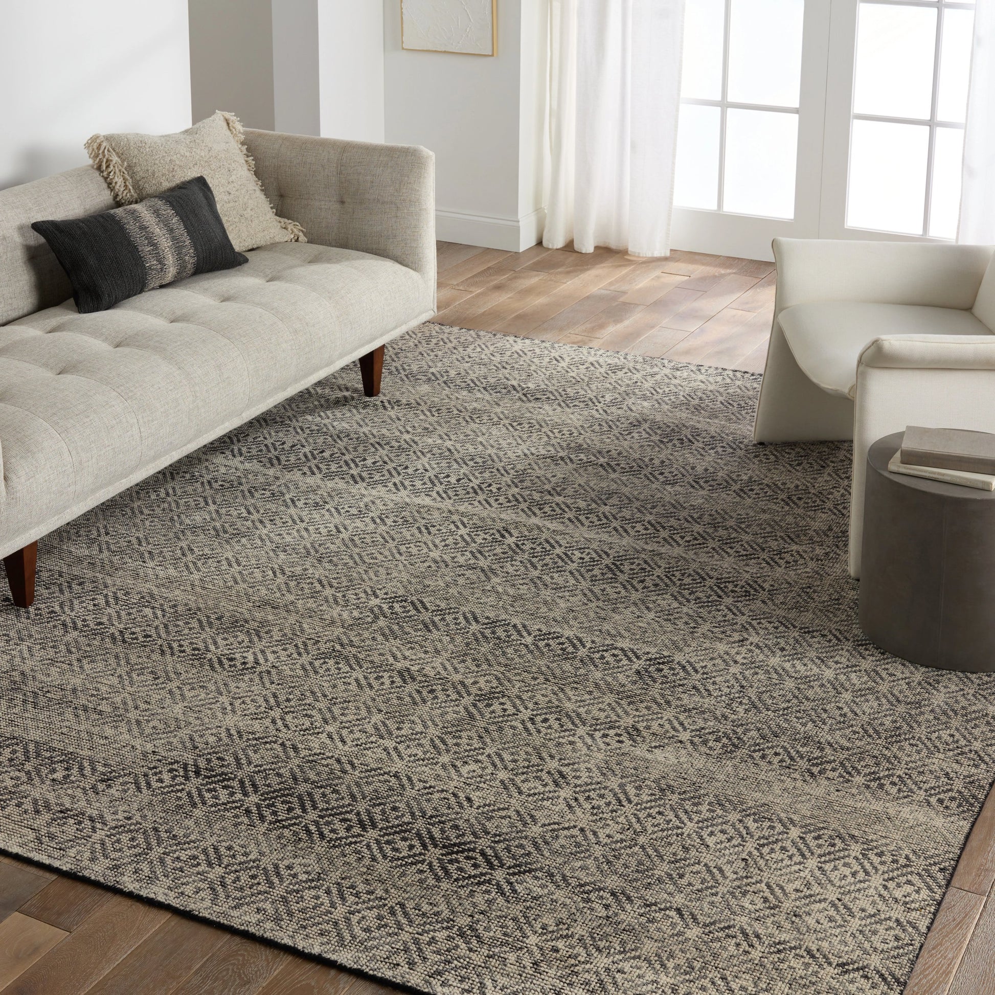 Rize Akello Rug by Jaipur Living in black, cream. Made from 100% wool in a unique style.