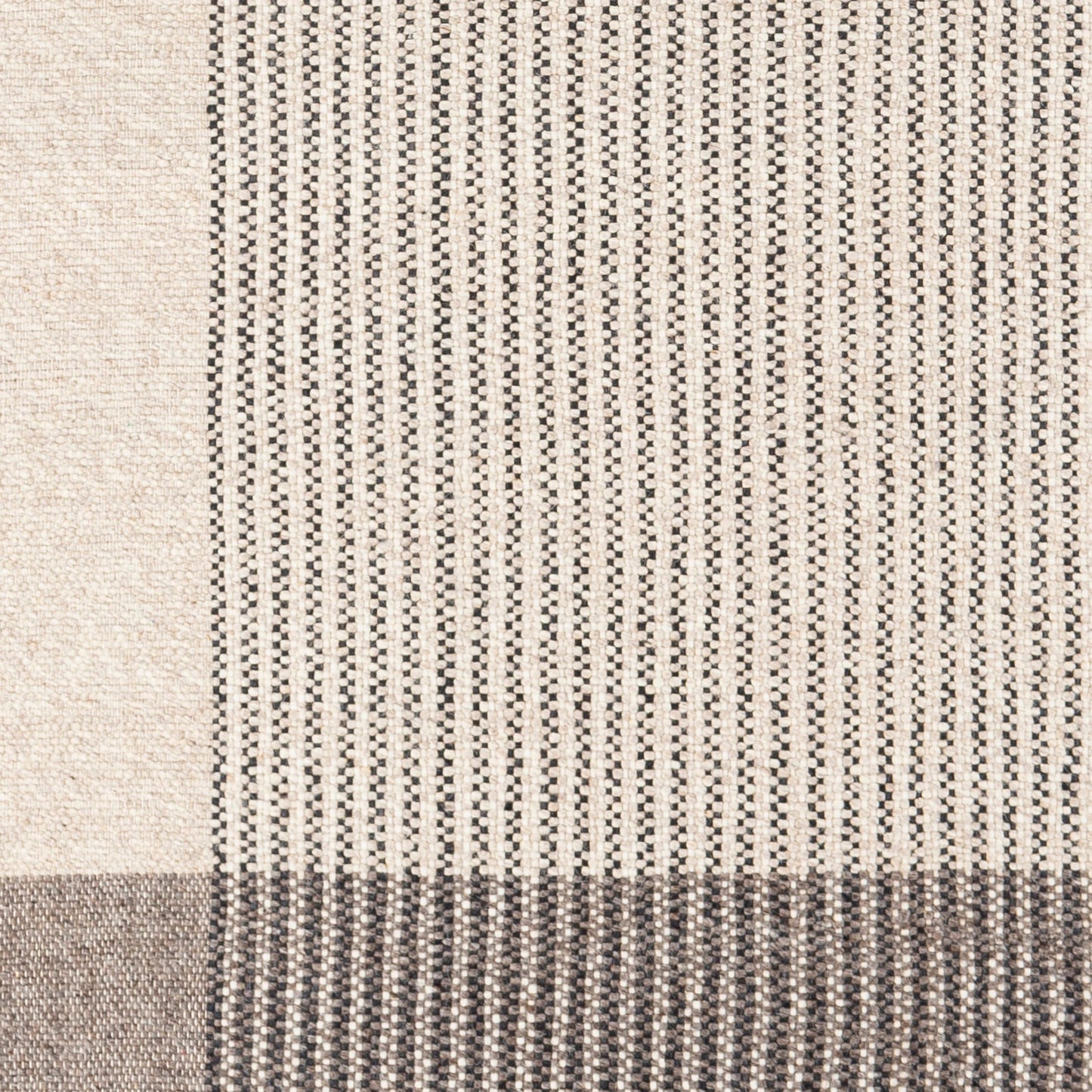 007 SI-1889581,SI-1889582,SI-1889583,SI-1889584,SI-1889585,SI-1971010,SI-1971011 | Closeup | Reliance Rug - 27884 by Surya in charcoal, medium gray, black, tan, cream. Made from unique in a unique style.