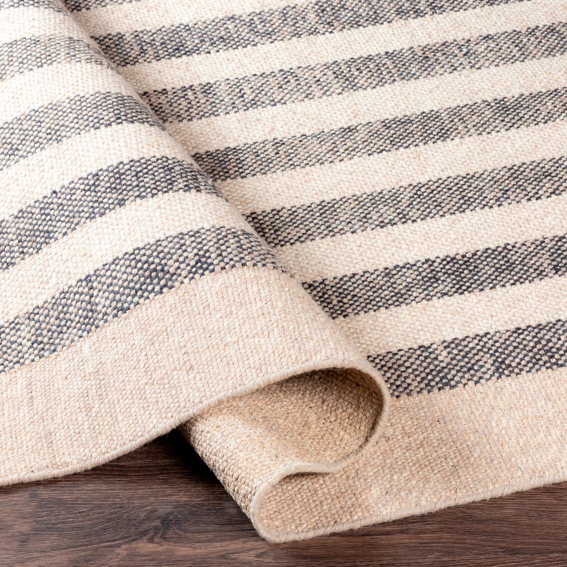 Reliance Rug - 27886 by Surya in black, light beige, cream. Made from 100% wool in a unique style.