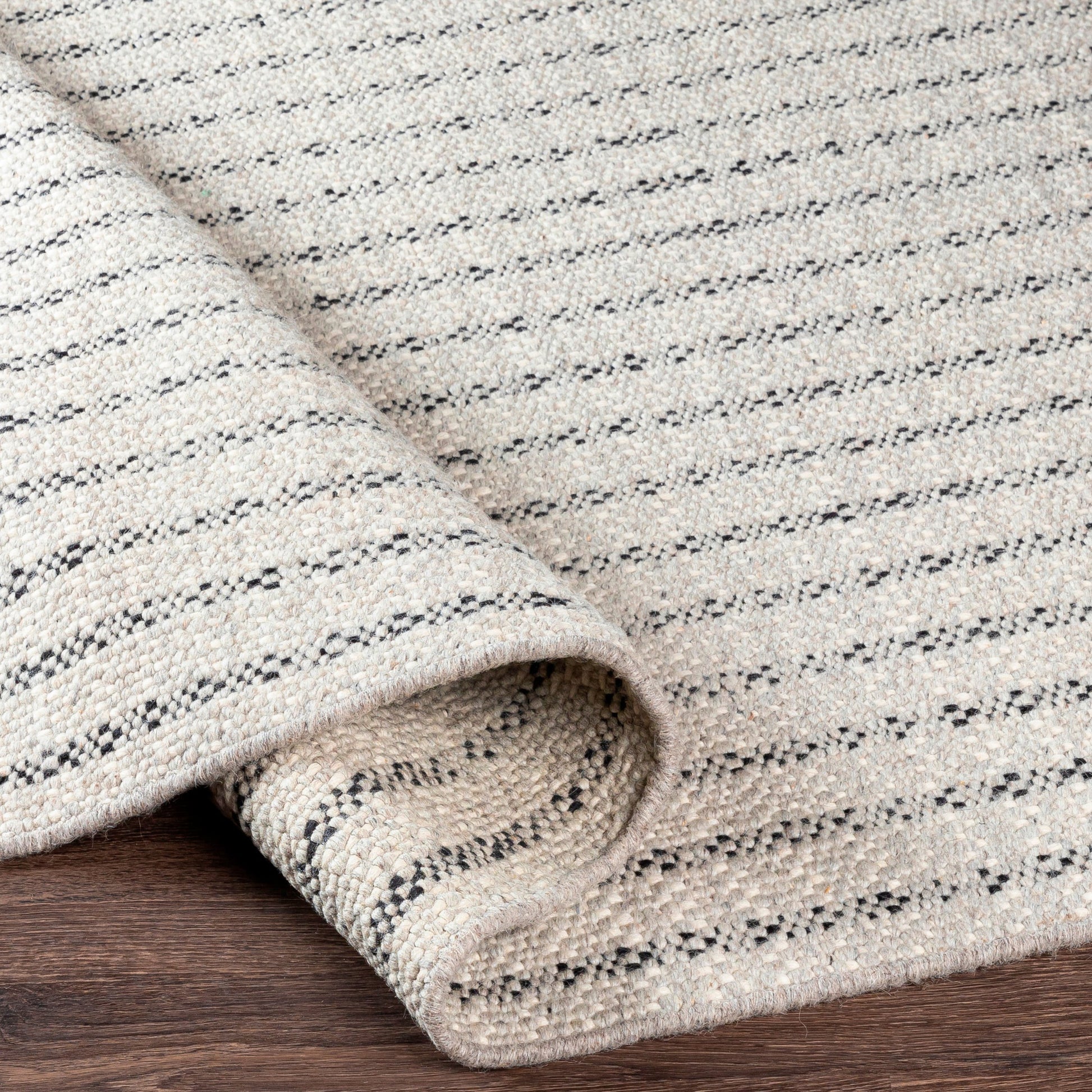 Reliance Rug - 27893 by Surya in black, light gray, cream. Made from 100% wool in a unique style.