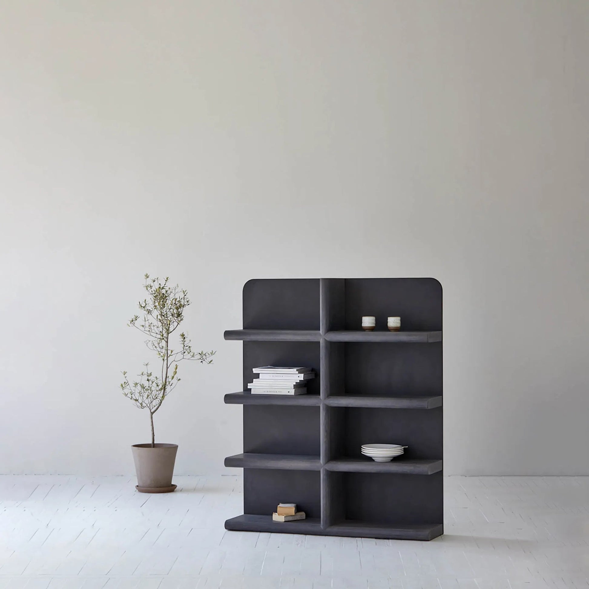 Julian Bookcase by LH Imports in black and smoked black. Made from mdf fiber-reinforced concrete, oak wood in a modern style.