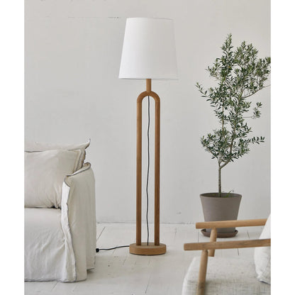 Dolce Standing Lamp by LH Imports in brown, white and natural. Made from oak, linen shade, metal in a unique style.