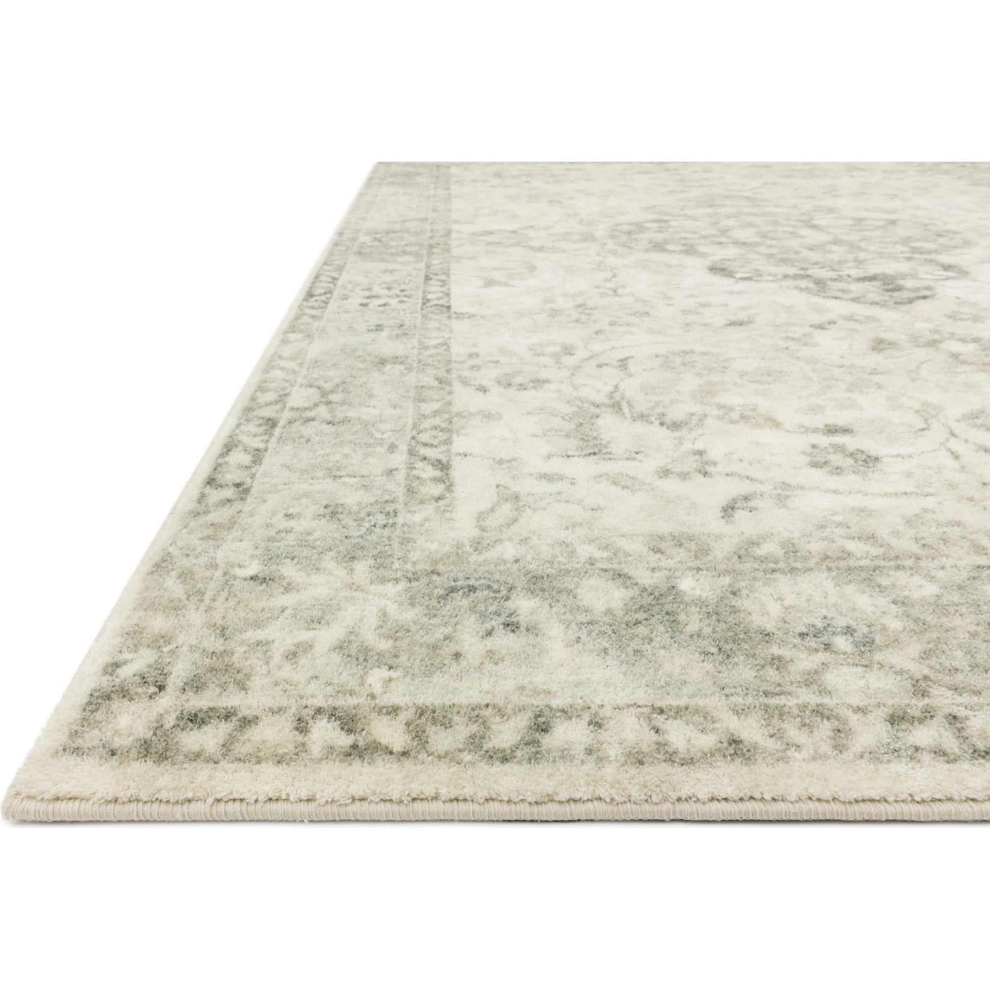 Rosette Olivia Rug by Loloi in ivory, silver. Made from 100% polyester in a traditional style.