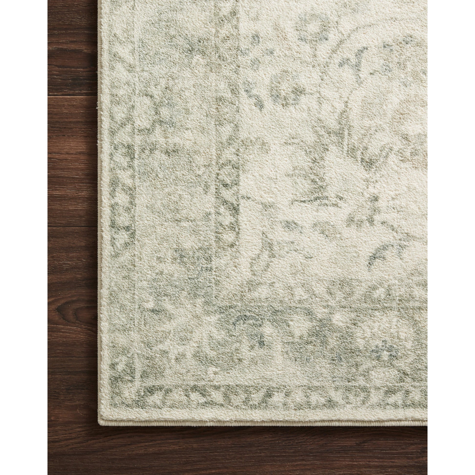 Rosette Olivia Rug by Loloi in ivory, silver. Made from 100% polyester in a traditional style.