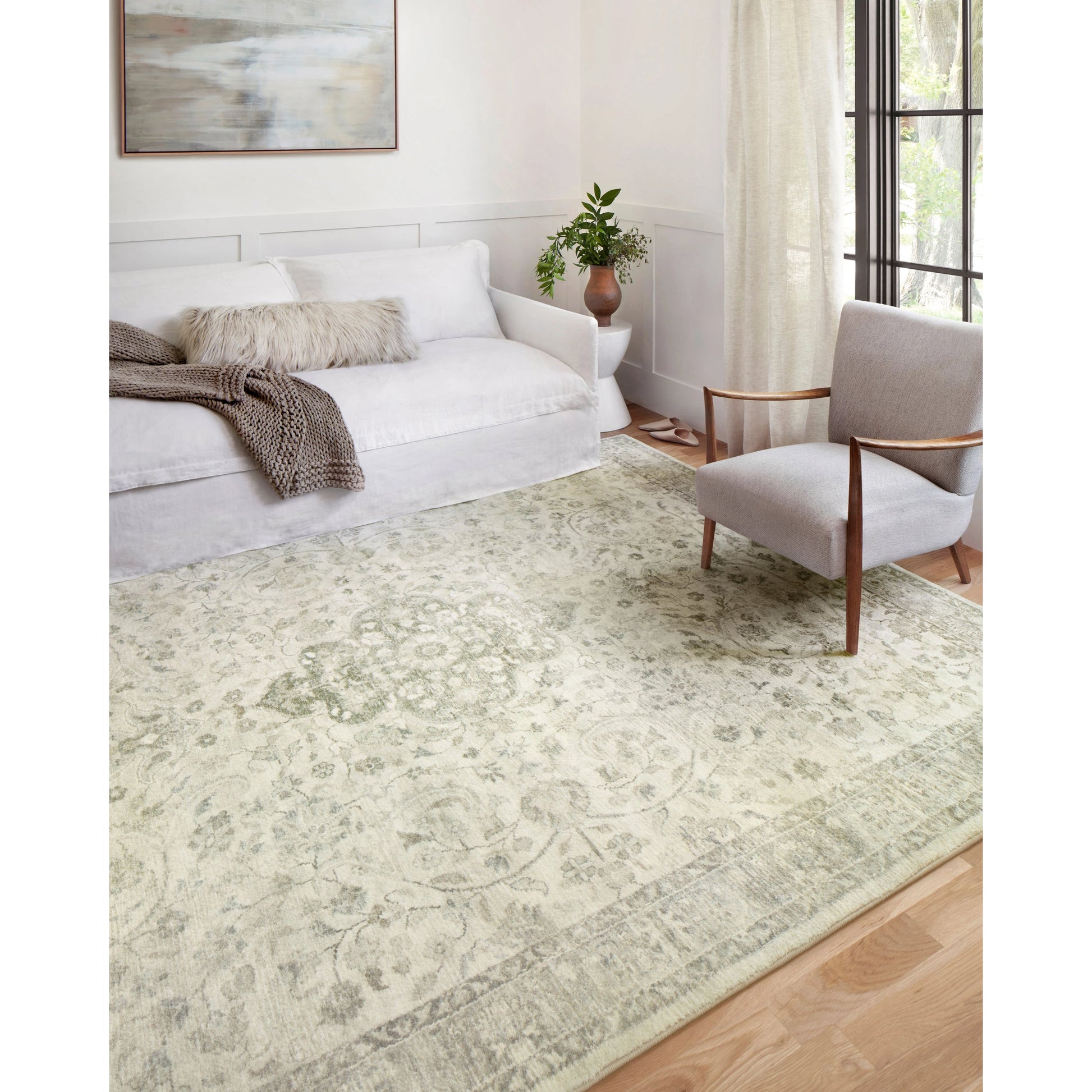 Rosette Olivia Rug by Loloi in ivory, silver. Made from 100% polyester in a traditional style.