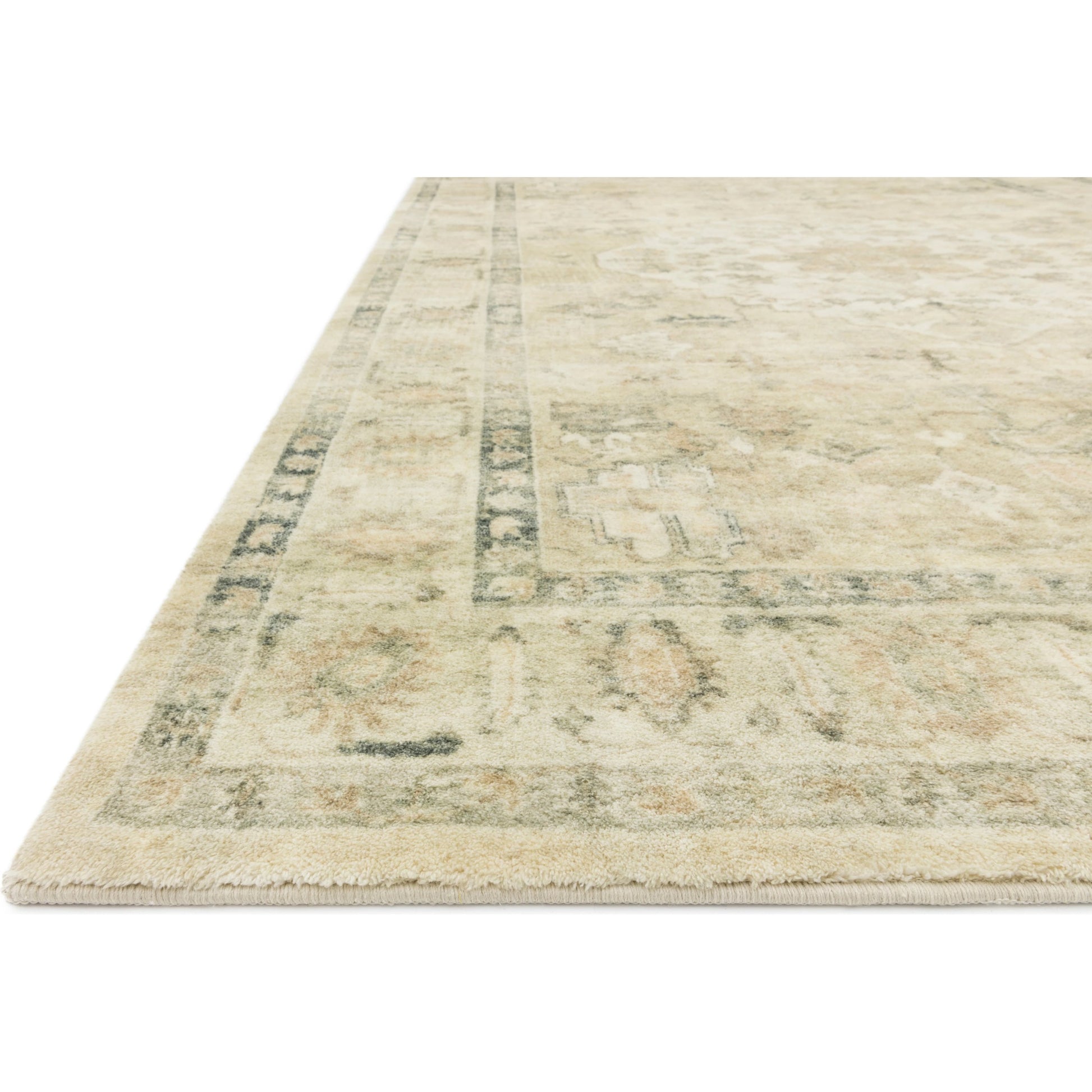 Rosette Emerson Rug by Loloi in sand, ivory. Made from 100% polyester in a traditional style.