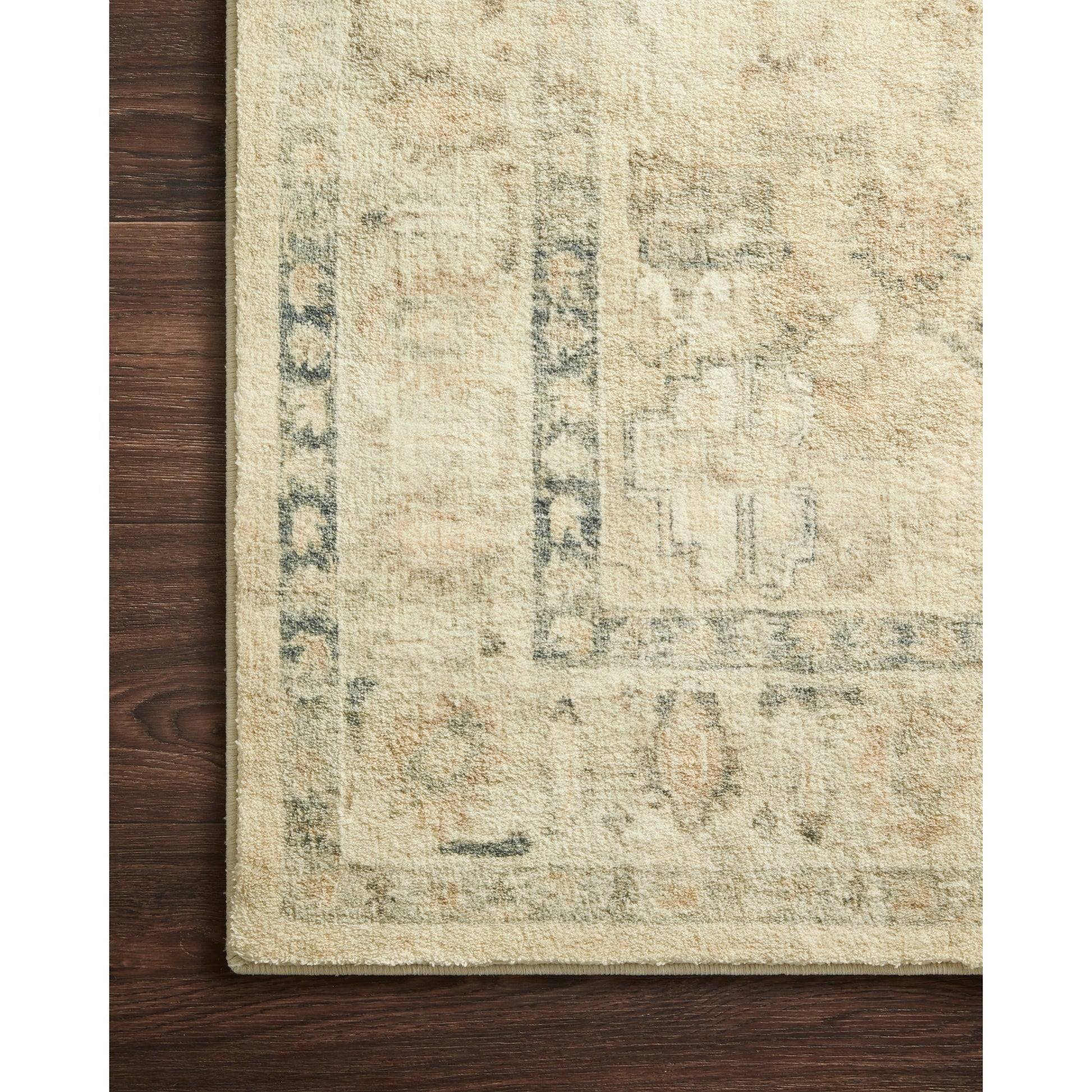 Rosette Emerson Rug by Loloi in sand, ivory. Made from 100% polyester in a traditional style.